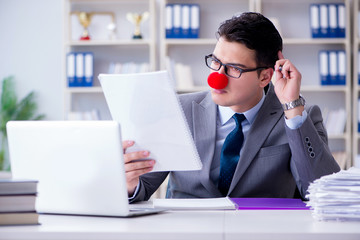 Fototapeta premium Clown businessman in the office