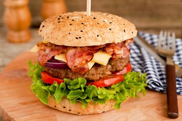 Bacon cheese burger with beef patty tomato onion