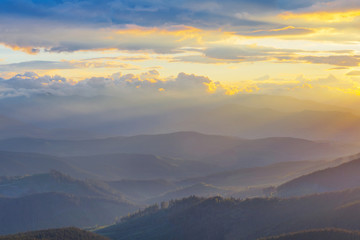 evening  mountain valley in a blue mist