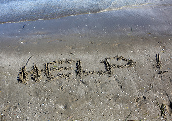 HELP text on the sand