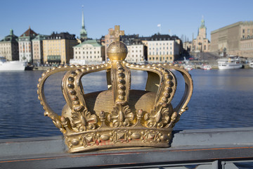 Royal Crown on Skeppsholm Bridge with Old Town in Background; Stockholm