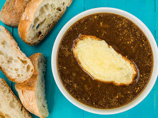 Bowl of French Onion Soup With Toasted Bread and Melted Cheese