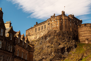 Fototapeta na wymiar An wide shot of the Edinburgh Castle, Scotland, UK shot against a beautiful blue sky, Scotland, UK