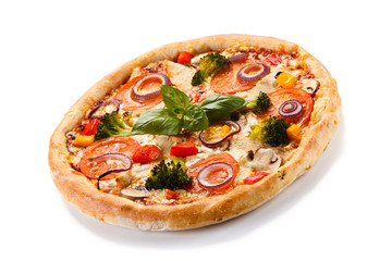 Pizza with vegetables on white background