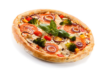 Pizza with vegetables on white background