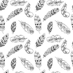 Beautiful seamless pattern with feathers in boho style in black and white colors. Sketch vector illustration. Native American, ethnic background