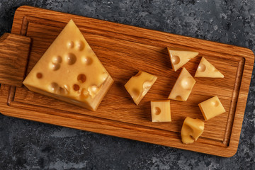 Cheese on cutting board.