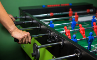 Table football with red and blue players