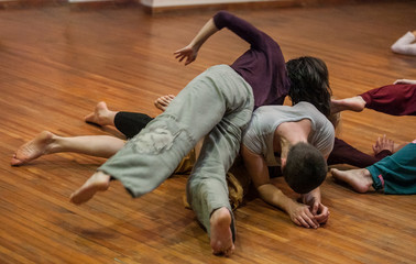  dancers contact, on floor