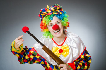 Funny clown in comical concept