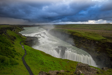 Iceland - Majestic waterfall Gulfoss at dawn with clouds