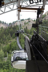 The Alps, France-Italy border, 29 July 2017 - Skyway cable car revolving cabin travelling to Punta Helbronner (Pointe Helbronner) in the Graian Alps