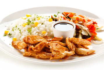 Chicken nuggets, white rice and vegetables