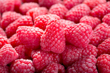 fresh raspberries as background