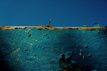 Naklejka premium Old wooden board covered with old paint