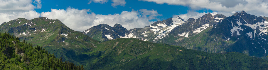 Tops of mountains range with snow caps. Greater Caucasus Mountain Range.