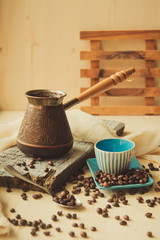 Close up roasted coffee beans in paper bags on wooden background