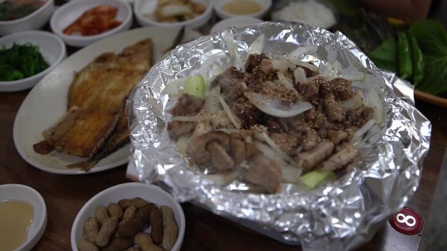 4K, Dish of Inshore Hagfish South Korean Restaurant near to Seafood Market In Jagalchi Fish Market. Eating kkomjangeo for lunch in Busan city, South Korea-Dan