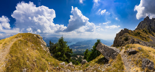 Panoramic elevated view on Serre-Poncon lake in summer from the Chabriere Needle (Aiguilles de Chabrieres). Hautes-Alpes, PACA Region, Southern French Alps. France