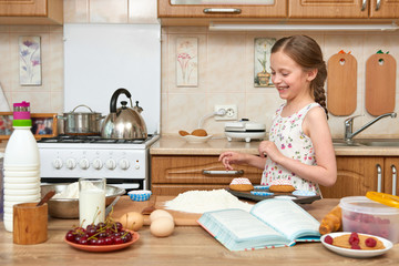 Obraz na płótnie Canvas Girl baking cookies. Home kitchen interior. Healthy food concept