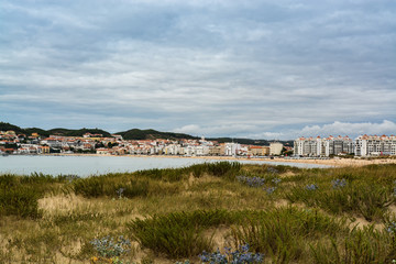 Fototapeta na wymiar Sao Martinho do Porto beach in Sao Martinho do Porto, Portugal.