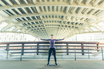 Woman doing stretching excercises, portrait with simmetry