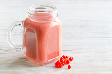 Smoothies of red currant and banana in jar