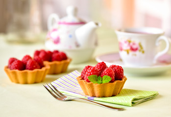 Mini tart with raspberries fruits