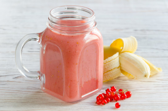 Smoothies of red currant and banana in jar