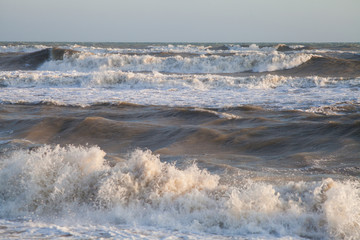 surf waves at sea in a storm
