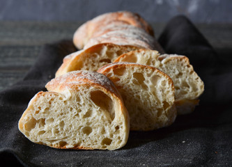 Sliced bread on a black background.