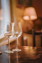 Wine glass in a restaurant closeup, warm and elegant