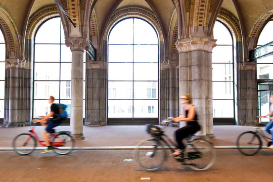 Moving cyclist along street in Amsterdam