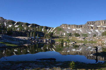 Fototapeta premium Hiker on Lake in Grand Teton National Park