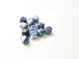 Tumbled jasper stones for crystal therapy treatments and reiki detail isolated