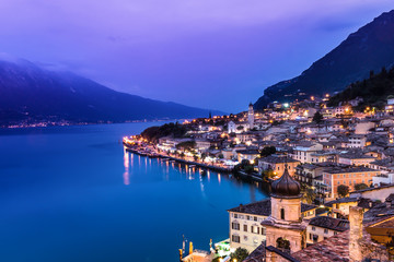 Fototapeta na wymiar Limone suul Garda at Lake Garda in the evening - Italy