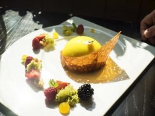 Mango parfait with passion fruit twill