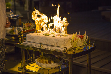Lamb baked in salt. Meat baked in a salt crust with vegetables. Meat in the salt crust burns.