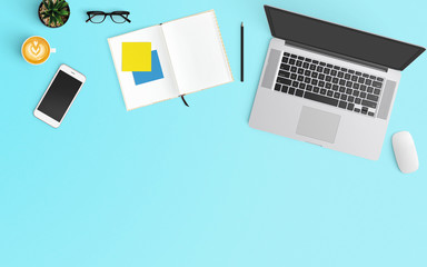 Modern workspace with coffee cup, notebook, smartphone and laptop copy space on Blue color background. Top view. Flat lay style.