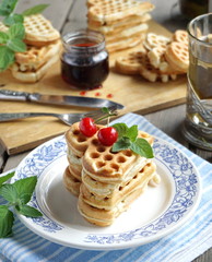 Waffles with cherry jam