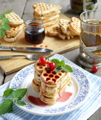 Waffles with cherry jam