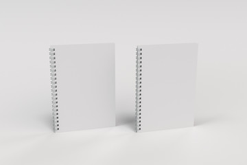 Two notebooks with spiral bound on white background