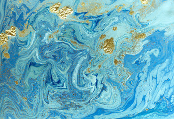 Fototapeta na wymiar Marbled blue and golden abstract background. Liquid marble pattern