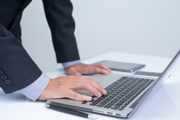 Businessman working on laptop computer