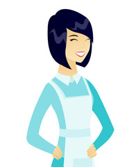 Young asian cleaner laughing.