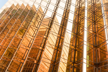 Gold colour office building tower facade  in business center