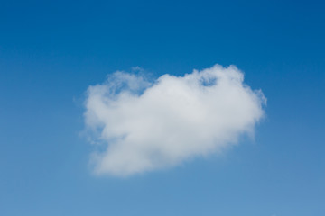 single cloud on clear blue sky