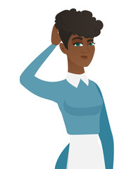 Young african-american cleaner scratching her head