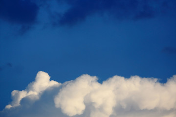 Obraz premium white cloud above blue sky