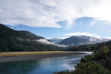 Fototapeta na wymiar Beautiful landscape of the meadow and river along the road in New Zealand